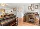 Open-concept living room with wood flooring and stylish furnishings, creating a comfortable living space at 171 Highland Woods Ct, Denver, NC 28037