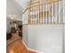 Spacious living room featuring fireplace, plush seating and staircase at 171 Highland Woods Ct, Denver, NC 28037