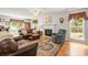 Inviting living room featuring a fireplace and comfortable seating, perfect for relaxing at 171 Highland Woods Ct, Denver, NC 28037