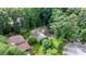 Aerial view of a home surrounded by dense trees, showcasing its secluded location and natural beauty at 1748 4Th Street Ne Ct, Hickory, NC 28601