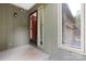 View of front door with a window, showing the home's entrance and exterior details at 1748 4Th Street Ne Ct, Hickory, NC 28601
