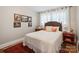 Inviting bedroom featuring a comfy bed with side tables and framed wall art enhancing the room's appeal at 1787 Eastover Dr, Mount Pleasant, NC 28124