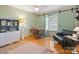 Charming dining area features a round wooden table set, a cushioned window seat and stylish furnishings at 1787 Eastover Dr, Mount Pleasant, NC 28124
