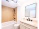 Bathroom featuring a tub, shower, vanity with modern fixtures, and elegant wood paneling at 1810 Highway 55 W Hwy, Clover, SC 29710