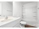 Clean, white bathroom features a shower-tub combination and a single sink vanity with modern fixtures at 2005 Amos Oaks Ln, Charlotte, NC 28215