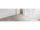 A neutral carpeted bedroom with white walls and trim features an open door, creating a bright and airy feel at 2005 Amos Oaks Ln, Charlotte, NC 28215