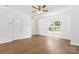 This well-lit living room boasts wood floors and neutral walls at 2005 Amos Oaks Ln, Charlotte, NC 28215
