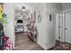 Inviting foyer with wood floors and stylish decor, showcasing the home's character at 203 Poplins Grove Church Rd, Albemarle, NC 28001