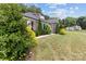 Charming brick home featuring lush landscaping and a well-manicured lawn at 203 Poplins Grove Church Rd, Albemarle, NC 28001