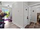 Bright hallway with wood floors leading to other areas of the home at 203 Poplins Grove Church Rd, Albemarle, NC 28001