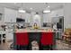 Kitchen island featuring granite countertops, white cabinets, and pendant lighting at 203 Poplins Grove Church Rd, Albemarle, NC 28001