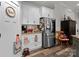 Modern kitchen with stainless steel appliances and white cabinets, with ample counter space at 203 Poplins Grove Church Rd, Albemarle, NC 28001