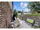 Outdoor patio featuring rocking chairs and seating area, perfect for relaxation and outdoor enjoyment at 203 Poplins Grove Church Rd, Albemarle, NC 28001