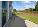Relaxing backyard patio with chairs and a view of the beautiful, landscaped yard at 205 Church St, Mcadenville, NC 28101