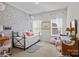 Charming bedroom featuring a wrought iron bed, butterfly decals, and natural light from the window at 205 Church St, Mcadenville, NC 28101