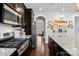 Bright kitchen with a gas range stove, stainless steel appliances, and granite countertops at 205 Church St, Mcadenville, NC 28101
