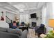 Comfortable living room with coffered ceilings, a fireplace, and ample seating at 205 Church St, Mcadenville, NC 28101