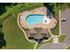 Aerial view of the large community pool and deck area with many lounge chairs at 205 Church St, Mcadenville, NC 28101