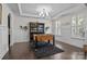 Recreation room with coffered ceiling, and large windows for natural light at 205 Church St, Mcadenville, NC 28101