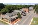 Aerial view of small town buildings, with shops and offices at 205 Church St, Mcadenville, NC 28101