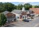 Shops and offices in a small town on a sunny day at 205 Church St, Mcadenville, NC 28101