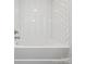Clean white bathtub with herringbone tile surround at 2090 Durand Rd, Fort Mill, SC 29715