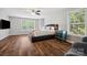 Primary bedroom featuring hardwood-style floors and lots of natural light at 2090 Durand Rd, Fort Mill, SC 29715