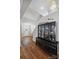 Welcoming entryway featuring a display cabinet and beautiful hardwood floors at 2090 Durand Rd, Fort Mill, SC 29715