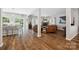 Bright and airy living room featuring hardwood floors, a fireplace, and an open layout at 2090 Durand Rd, Fort Mill, SC 29715