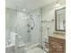 Modern bathroom featuring a subway tile shower with a frameless glass door at 2100 Darian Way, Waxhaw, NC 28173