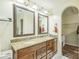 Elegant bathroom with a double vanity, granite countertops, and decorative mirrors at 2100 Darian Way, Waxhaw, NC 28173