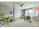 bedroom featuring neutral walls, carpet and a ceiling fan, creating an playful and inviting atmosphere at 2100 Darian Way, Waxhaw, NC 28173