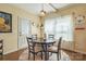 Cozy breakfast nook with a round table, natural light, and direct access to the exterior at 2100 Darian Way, Waxhaw, NC 28173