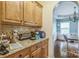 Kitchen area featuring granite counters, hardwood floors and modern appliances, perfect for home-cooked meals at 2100 Darian Way, Waxhaw, NC 28173