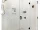 Glass-enclosed shower with white herringbone tile and bronze hardware at 2523 Irwin Stream Rd, Charlotte, NC 28208