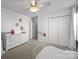 Inviting bedroom with dresser, plush carpet, neutral color scheme, and ample storage space at 3006 S Legacy Park Blvd, Indian Land, SC 29707