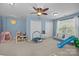 Bright bedroom offers lots of space for activities and features a cozy window seat at 3006 S Legacy Park Blvd, Indian Land, SC 29707