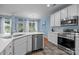 Lovely kitchen area features stainless appliances, white countertops, and modern cabinetry at 3006 S Legacy Park Blvd, Indian Land, SC 29707
