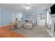 Spacious living room featuring a comfortable sectional sofa, fireplace, and elegant decor at 3006 S Legacy Park Blvd, Indian Land, SC 29707