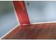 Bedroom with hardwood floors, fresh paint and red door at 3220 Harmony Hwy, Harmony, NC 28634