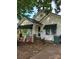 Charming single-story home with a welcoming front porch and awnings at 3220 Harmony Hwy, Harmony, NC 28634