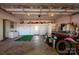 Spacious garage featuring lots of storage space, with several items neatly stored at 3220 Harmony Hwy, Harmony, NC 28634