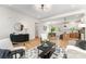 Bright and airy living room with hardwood floors that opens to the dining room and kitchen at 3486 Winters St, Newton, NC 28658
