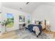 Cozy main bedroom with vaulted ceiling, two windows, and contemporary decor and natural light at 3486 Winters St, Newton, NC 28658
