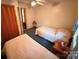 Bedroom featuring two beds, wood trim and a ceiling fan at 370 Miracle Dr, Salisbury, NC 28146