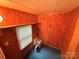 A small storage area or closet is shown with paneled walls at 370 Miracle Dr, Salisbury, NC 28146