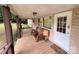 Inviting front porch with wood railings and stylish decor at 370 Miracle Dr, Salisbury, NC 28146