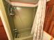 A standing shower with a shell-themed shower curtain is shown at 370 Miracle Dr, Salisbury, NC 28146