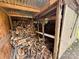Wood storage structure filled with firewood at 370 Miracle Dr, Salisbury, NC 28146