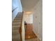 Inviting hallway with hardwood floors leading to the upper level at 3933 Cameron Creek Dr, Matthews, NC 28105